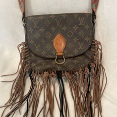 Customized Louis Vuitton Saint Cloud Crossbody. Custom Tooled Leather Strap (Has My Initials Ca), With Black And Brown Fringe. Lv Fringe Bag, Fringe Louis Vuitton Purses, Western Louis Vuitton Handbags, Western Louis Vuitton Purse, Louis Vuitton Fringe Crossbody Bag, Leather Tooling, Louis Vuitton Bag, Leather Straps, Black And Brown