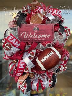 a football wreath with the words welcome to our team and an image of a football on it