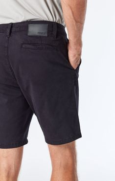 Timeless black trousers get a warm weather upgrade in streamlined shorts with a 9” inseam. They’re made with velvety-smooth twill that has a lightweight structure, subtle texture, and plenty of stretch. Model is 6'2.5" and wearing a size W32 Fabric Contents 97% Cotton, 3% Elastane; 280 GR Made in Turkey Classic Black Shorts For Business Casual, Classic Black Business Casual Shorts, Fitted Bermuda Shorts With Pockets In Black, Fitted Black Cotton Bermuda Shorts, Classic Black Knee-length Shorts, Fitted Black Shorts For Business Casual, Lightweight Structure, Modern Closet, Black Trousers