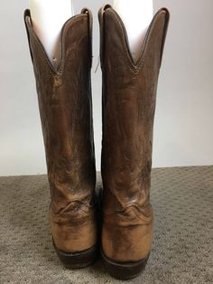 Vintage brown leather western cowboy boots size 9.5 well worn but still in great shape Toe to wall insole 11.5 Inches Ball of foot 4 Inches Height 13 inside Calf circumference 15 Inches Country Style Distressed Brown Boots For Ranch, Western Boots In Distressed Brown With Moc Toe, Rugged Steel Toe Boots For Western-themed Events, Distressed Brown Western Moc Toe Boots, Distressed Brown Snip Toe Boots For Ranch, Western Steel Toe Moc Toe Boots, Distressed Brown Moc Toe Western Boots, Distressed Brown Snip Toe Ranch Boots, Country Style Distressed Brown Snip Toe Boots