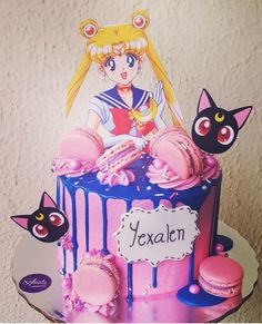 there is a cake decorated with anime characters on it