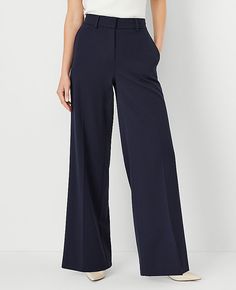 Our wide-leg pant is a modern must-have with a perfect drape and high waist that endlessly flatters. Front zip with double hook-and-bar closure. Belt loops. Front off-seam pockets. Back besom pockets.,Leg Shape:Wide Leg – a modern must-have with a statement leg and flattering high waist,Rise:High rise: sits 1/2" to 1" below natural waist,Imported:Imported,Fit:Tailored & fitted,Length:Full length: 31" inseam with 25" leg opening,Fabrication:62% Polyester, 34% Viscose, 4% Spandex,Garment Care:Mach Tailored Ankle-length Wide Leg Pants, Chic Navy Wide-leg Pants, Classic Full-length Navy Pants, Classic Navy Full-length Pants, Navy Relaxed Fit Wide-leg Pants, Knitted Suit, Wide Leg Pant, Pin Up Style, Fashion Books