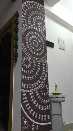 the wall is decorated with an intricate design