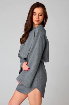 Buddy Love: Willa Sweatshirt Dress - Heather Grey A sweatshirt dress is exactly what we've had our eye on! The Willa dress is a complete mix of comfy and cute all in one. This sweatshirt material dress is featured with an elastic waist, a body-con mini skirt, and a loose fitting top silhouette. The bell sleeves are the star of the show and adds just the right amount of flair to this look. Pair this sweatshirt dress with sneakers for the most adorable fit. heather grey sweatshirt dress bust: rela Heather Grey Sweatshirt, Buddy Love, Material Dress, Loose Fitting Tops, Sweatshirt Dress, Grey Sweatshirt, Dress With Sneakers, Heather Grey, Bell Sleeves