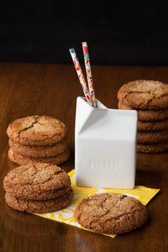 cookies and milk are sitting on a table