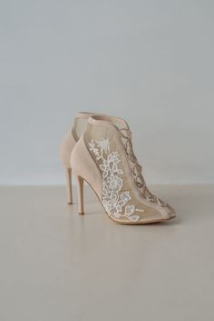 Wedding shoes 'Flower Laces' are handcrafted from soft Italian suede with handmade embroidery on the soft mesh. Romantic boots with a peep toe and lace-up down the front on a pointy heel. They are decorated with lace embroidery with sprigs of blooming flowers. Thanks to the adjustable lacing, this pair will fit any width. Inside there is a soft memory foam insole, which gives a feeling of additional comfort when walking. Tunit outsole is made of a mixture of leather chips and rubber, it's more w Embroidered High Heel Wedding Shoes, Lace High Heel Wedding Shoes, Cream Lace Open Toe Wedding Shoes, Floral Embroidered High Heel Wedding Heels, Floral Embroidered High Heels For Wedding, Spring Wedding Heels With Floral Embroidery, White Embroidered Round Toe Heels, Beige Fitted Closed Toe Wedding Shoes, Wedding Heels With Floral Embroidery And Round Toe