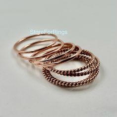 Welcome Dear Buyer, Minimalist Set of 8 Solid copper rings textured hammered Handmade item Materials: Pure Cooper  Style: Minimalist Hammered wide-Cooper band Ring for women. Perfect as a gift for a loved one. ❥ Metal: Pure Cooper ❥ US Ring Size: Choose Size This is a wide ring. We recommend choosing a half or a full size up than your regular size for best fit. Thanks & Regards Copper Rings Women, Minimalist Rose Gold Metal Midi Rings, Rings Women, Wide Ring, Wide Rings, Copper Rings, Style Minimalist, Ring For Women, Stackable Rings