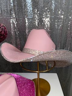 Our pink & crystal hat features our pink hat+ crystal rhinestones on the underneath brim and a matching hat band. Perfect for those who can't get enough of pink! This hat features: Pink straw hat Crystal rhinestones on the underneath brim Matching crystal rhinestone hat band crystal rhinestone trim on edges Sizing: Our pink hats offer sizes S/M and L/XL. We recommend the S/M if you wear a hat size of 7 1/8 or smaller (equivalent to head circumference of 57 CM or 22 1/4 inches). We suggest the L/ Pink Bling Quinceanera Dresses, Pink Rhinestone Cowgirl Hat, Diy Barbie Cowboy Hat, Pink Rhinestone Cowboy Hat, Pink Rhinestone Cowgirl Outfits, Rhinestone Cowboy Hat Diy, Pink Tejana, Surprise Dance Outfits Quinceanera Pink, Bedazzled Cowboy Hat