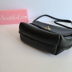 "Vintage Coach Quincy Bag Black leather with brass hardware Roomy interior with slip pocket covered by a flap and secured with a turnlock Made in the United States #B5D-9919 Measures: 9\"L, 7\"H, 3\"W Strap measures: 52\" Can be worn over shoulder or crossbody if possible Made in the United States Cleaned, conditioned and ready to wear! Questions? Just ask More vtg coach styles/colors also available Lr" Vintage Coach Bags, Vintage Coach, Tiffany Blue, Sewing Bag, Custom Bags, Brass Hardware, 7 H, New Bag, Coach Bags