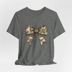 Womens right 2024 Hunting mama shirt, camo womens bow shirt. ---------- How to Order Your Custom Design T-shirt ---------- * Choose your t-shirt color * Choose your size * PLEASE make sure all your order's steps ---------- Product ---------- Made from very soft materials, this tee is 100% cotton for solid colors. Heather colors and sports grey include polyester. The shoulders have twill tape for improved durability. There are no side seams. The collar is made with ribbed knitting to prevent curl Camouflage Short Sleeve Top With Letter Print, Camo Shirt, Bow Shirt, Womens Camo, Bow Shirts, Camo Shirts, Fall Tee, Duck Hunting, Coquette Bow