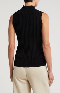 Classic rib knitting sweetens the style of a soft, lightweight sweater perfect for building cold-weather outfits. 24" length (size Medium) Mock neck Sleeveless 100% cashmere Dry clean Imported Ribbed Vest For Winter Layering, Ribbed Vest For Fall, Classic Sleeveless Ribbed Top, Black Turtleneck Tank Top For Spring, Winter Ribbed Vest, Sleeveless Black Sweater For Work, Black Sleeveless Fine Knit Tank Top, Fitted Textured Knit Vest For Spring, Casual Fitted Textured Knit Vest