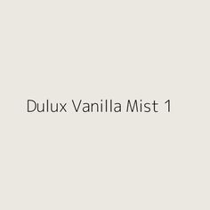 the words dulux vanilla mist are in black and white on a light gray background