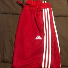 Never Worn - Adidas Sweatpants Brand New But No Tags. Size L Adidas Red Casual Bottoms, Red Sports Sweatpants With Pockets, Red Casual Adidas Bottoms, Red Sportswear Pants With Pockets, Adidas Sporty Red Bottoms, Sporty Red Pants With Side Stripes, Red Sporty Trousers, Red Cotton Sports Pants, Adidas Red Cotton Pants