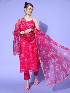 Flaunt your glam look when you step out donning this voguish kurta set. Tailored with an attractive square neck and calf length, this kurta set is a must-have. Kurta:Magenta colourAttractive square neckSleevelessCalf lengthOrganza, dry cleanTrousers:Solid trousersPartially elasticated waistCotton blend, dry cleanDupatta:Taping borderPrinted patternOrganza, Dry CleanSize & FitSize worn by the model: SChest: 32"Waist: 24"Hips: 36"Height: 5'8"Material & CareTop: OrganzaTop Inner: ShantunBottom: Cot Spring Straight Kurta With Sheer Dupatta, Festive Spring Unstitched Straight Kurta Suit, Elegant Straight Kurta Anarkali Set For Summer, Elegant Anarkali Kurta Set For Summer, Elegant Anarkali Set With Straight Kurta For Summer, Festive Spring Unstitched Suit With Straight Kurta, Unstitched Straight Kurta Salwar Kameez For Summer, Summer Straight Kurta With Sheer Dupatta, Party Straight Kurta Salwar Kameez With Printed Motifs