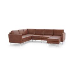 a brown leather sectional sofa with black legs and footrests on an isolated white background