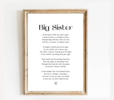 a framed print with the words big sister in black ink on it's white background