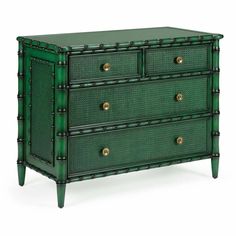 a green bamboo dresser with brass knobs on the top and bottom drawers, against a white background