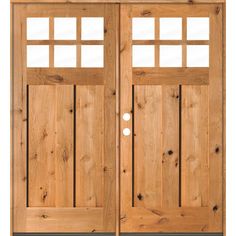 two wooden doors with windows on each side