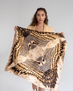 Elevate your style with the exclusive "Owl with Wings" silk scarf from Zlitay. This luxurious scarf is crafted from 100% high-quality natural silk, ensuring incredible softness and comfort. With a size of 90x90 cm (35x35 inches), it’s versatile for various uses: as a chic head accessory, a stylish neck piece, or even as an elegant decoration for your bag or other accessories.

Features:

Material: 100% Natural Silk
Size: 90x90 cm (35x35 inches) White Satin Dress, Beige Scarf, Gift Idea For Women, Owl Pattern, Brown Scarves, Summer Scarf, Owl Gifts, Pattern Scarf, Owl Patterns