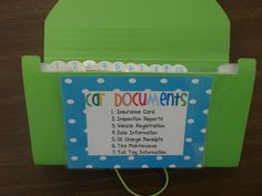 a green box with a sign that says cat docu - anns on it