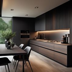 a modern kitchen with dark wood cabinets and black chairs is seen from across the room