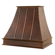 an old fashioned copper range hood on a white background