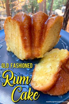 an old fashioned rum cake on a blue plate with the words old fashioned rum cake