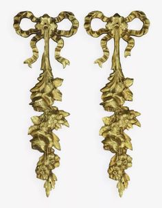 pair of gold - plated wall sconces, possibly from the late 19th century