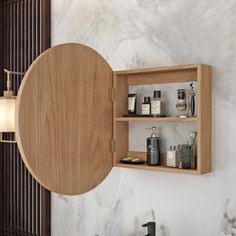 a wooden shelf mounted to the side of a wall next to a sink and mirror