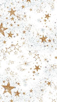 a white background with gold stars and snow flakes