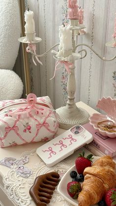 a table topped with pastries and desserts