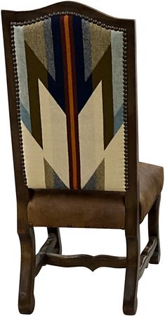 a wooden chair with an upholstered back and seat cushion on it's side