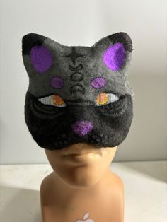 This is a listing for one of my newer works! It is a felted and colored cat mask that I designed and created myself. This is a high-end medium quality mask, and Buying this masks gives you all of rights to this character! Please credit me with the design and mask, though. The mask is made from a paper cat mask base, and then felted using Joan's felt. It is very sturdy and high quality, perfect for doing quadrobics or hanging up on your wall for decoration!  If you have any questions, please feel free to reach out! Halloween Cat Design Eye Mask, Cat Design Costume Eye Mask, Cat Design Eye Mask For Costume, Costume Cat Design Eye Mask, Cat Therian Mask, Cat Therian, Paper Cat, Felted Cat, Therian Mask