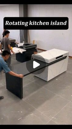 two men are working on a table in an office with the words rotating kitchen island