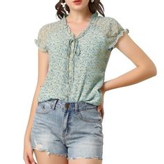 Floral Print Ruffle Short Sleeve Chiffon Top (S) Color Light Blue And Floral Size S It Has A Loose Fit That Falls To The Hip So You Can Easily Tuck It Into Skirts Or Jeans. 100% Polyester Floral Print V Neck Short Raglan Sleeve Ruffle Trim Partially Lined Tie Front Decor Mock Placket Regular Fit Chiffon Blouses Chest Girth 37 3/4 Inches Waist Girth 37 Total Length 25 3/8 C-38 Casual Floral Print Chiffon Tops, Casual Chiffon Tops With Floral Print, Casual Chiffon V-neck Top, Casual Chiffon Blouse With Floral Print, Summer Floral Print Chiffon Tops, Green Casual Chiffon Tops, Casual Chiffon Tops With Ruffles, Green Chiffon Casual Tops, Casual Ruffled Chiffon Blouse