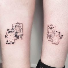 two people with matching tattoos on their legs, one has an easel and the other has a raccoon