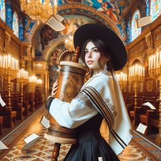 a woman in a black hat holding a large vase