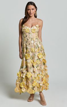 Amalie The Label - Mia Strappy Flower Detail Midi Dress in Yellow | Showpo USA Summer Wedding Midi Dress With Floral Embroidery, Maxi Dress With Floral Applique For Spring, Spring Floral Embroidered A-line Maxi Dress, Beige Floral Embroidered Midi Dress For Spring, Beige Floral Embroidery Midi Dress For Garden Party, Summer Floral Dress With Applique For Garden Party, Spring Beige Midi Dress With Floral Embroidery, Beige Floral Embroidery Midi Dress For Spring, Spring Floral Applique Maxi Dress