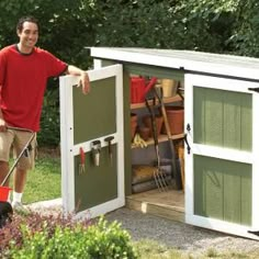 a man standing next to a garden shed with tools in the door and on the ground