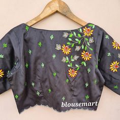 1. Fabric - Silk. 2. Embellish with Embroidery. 3. Boat neck blouse. 4. Elbow Sleeves Blouse. 5. Customize in any color and size. Fitted Blouse With Multicolor Embroidery For Wedding, Fitted Multicolor Embroidered Blouse For Wedding, Fitted Wedding Blouse With Multicolor Embroidery, Black Blouse Piece With Floral Embroidery For Wedding, Wedding Blouse With Floral Embroidery For Festivals, Black Blouse With Intricate Embroidery For Wedding, Multicolor Embroidered Wedding Top, Designer Semi-stitched Floral Embroidered Blouse Piece, Blue Semi-stitched Blouse Piece With Floral Embroidery