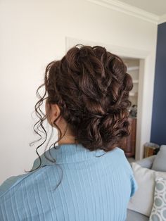 enhance your natural hair withba textured low bun Curly Low Bun Bridal Hair, Bridal Hair Low Bun Curly, Wedding Curly Bun, Low Bun Short Curly Hair, Curly Bun Updo Wedding, Low Bun Wavy Hair, Low Curly Messy Bun, Curly Hairstyles Low Bun, Curly Bun Prom