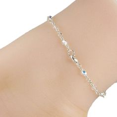 This beautiful and elegant crystal anklet is made with 4mm clear AB Swarovski crystals and decorative sterling silver chain. The anklet has a sterling silver lobster clasp. A lovely anklet that will add glamour to your outfit. Please choose your size from the drop-down menu, bearing in mind that the anklet should be approximately one inch larger than the size of your ankle. The anklet will arrive in an attractive gift box. Elegant Crystal Anklets For Gifts, Silver Anklet With Lobster Clasp For Gift, Elegant Silver Anklets With Lobster Clasp, Elegant Crystal Bracelet With Lobster Clasp, Silver Cubic Zirconia Anklets For Gift, Silver Cubic Zirconia Anklets As Gift, Silver Chain Anklet, Crystal Anklet, Chain Anklet