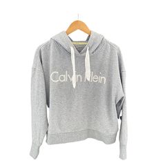 Calvin Klein Performance Cropped Women’s Sweatshirt Size Xl 60% Cotton 40% Polyester Grey Body With White Calvin Klein Embroidered Name Hooded With Cream Pull/Tie Machine Wash @Mfitzee Is For Anyone Who Wants To Stay Up-To-Date With The Latest Trends. We Offer An Assortment Of Clothing, Jewelry, Accessories, And Home Goods From Hundreds Of Your Favorite Brands. We Offer Brand New, Like New, And Pre-Owned Clothing And Accessories. Our Goal Is To Provide Our Customers With Unique, Good Quality Pie Spring Logo Print Hoodie, Calvin Klein Logo Print Sweatshirt For Fall, Calvin Klein Long Sleeve Sweatshirt With Logo Print, Calvin Klein Long Sleeve Tops With Logo Print, Calvin Klein Long Sleeve Logo Print Tops, Calvin Klein Winter Sweatshirt With Ribbed Cuffs, Calvin Klein Cotton Hoodie For Fall, Calvin Klein Hooded Sweatshirt For Fall, Calvin Klein Hooded Hoodie For Fall