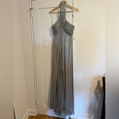 New Dress With Tag . Size 6 Silver Sleeveless Summer Evening Dress, Silver Sleeveless Evening Dress For Summer, Metallic Dress For Wedding And Holiday, Metallic Holiday Wedding Dress, Silver Sleeveless Evening Dress For Spring, Silver Sleeveless Party Gown, Fitted Silver Evening Dress For Prom, Gray Dress For Prom Season, Silver Sleeveless Prom Dress