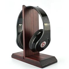 the wooden headphones stand is made out of wood