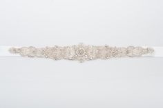 "wedding sash, wedding dress sash, beaded Bridal sash, rhinestone wedding belt, crystal bridal belt, rhinestone bridal belt SOLANGE hand beaded and feature lot of stunning clear and ivory glass beads, crystal and clear rhinestones and ivory silk petals, Hand beaded, high end finished, attached to a luxurious satin ribbon much more beautiful in person, this piece can be attached directly to the dress 92 inch sash 1 1/2 inches wide satin ribbon in the color of your choice gorgeous hand beaded appl Beaded Bridal Sash, Pearl Veil, Wedding Dress Sash, Custom Ribbon, Dress Sash, Wedding Sash Belt, Beaded Wedding, Wedding Sash, Bridal Sash