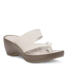 A just-right wedge and seamless straps add casual elegance to our Laurel sandal. Full-grain leather straps. Eastland Exclusive Active Memory Foam comfort insole supports and conforms to the curves of your foot. Shock absorbing Polyurethane outsole offe | Women's Eastland Laurel Thong Sandal, White, 9M Comfortable Leather Toe Post Wedge Sandals, Leather Wedge Sandals With Arch Support For Beach, Modern Wedge Sandals With Arch Support For Beach, Adjustable Synthetic Wedge Sandals With Leather Footbed, Comfortable White Wedge Sandals With Arch Support, Synthetic Toe Post Wedge Sandals, Comfortable Wedge Heel Sandals With Heel Loop, Comfortable Synthetic Toe Loop Sandals, Comfortable Sandals With Wedge Heel And Heel Loop