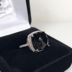 Gorgeous Black Onyx & Sterling Ring * Genuine Cushion Cut Black Onyx measures 12x12mm * Brilliant Cut Cubic Zirconia accents * Solid Sterling Silver * Size 6, 7 or 8 - Select Your Size Hallmarked & Gift Ready! TIMELESS, BEAUTIFUL & UNIQUE FINE ART JEWELRY! Trending Jewelry, Ring Halo, Gifts For Fiance, Pink Sapphire Ring, Fine Art Jewelry, Black Onyx Ring, Onyx Ring, Sapphire Stone, Art Jewelry