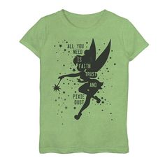 a green t - shirt with an image of a fairy on it