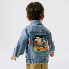 Get your little one ready for some fun adventures with this adorable Cartoon Print Denim Jacket. Made from high-quality cotton, this unisex jacket is perfect for kids aged 1-6 years. The turn-down collar and regular sleeve style add a stylish touch, while the cartoon print adds a playful charm. With a comfortable fit that's true to size, this jacket is ideal for all-day wear. Whether they're playing outdoors or heading to a party, your child will look cute and fashionable in this versatile outerwear. Embrace the joy of dressing up with this delightful denim jacket! 🌟🧥 Specifications: Material: Cotton Age Range: 1-6 years Gender: Unisex Department Name: Baby Collar: Turn-down Collar Sleeve Style: Regular Fabric Type: Denim Material Composition: Cotton Pattern Type: Cartoon Sleeve Length: Kids Denim Jacket, Fun Adventures, Printed Denim Jacket, Adorable Cartoon, Print Denim, The Cartoon, Romper Outfit, Girls Blouse, Denim Material